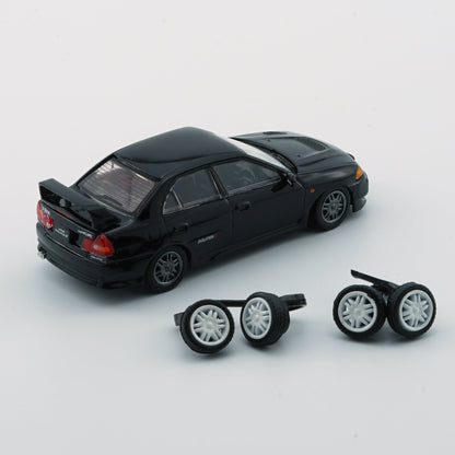 1:64 Mitsubishi Lancer Evolution IV – Black (LHD)