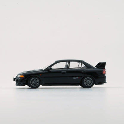 1:64 Mitsubishi Lancer Evolution IV – Black (LHD)