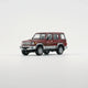 Toyota Land Cruiser LC76, 1:64 Scale (Dark Red) collectible diecast model at Poketwheels