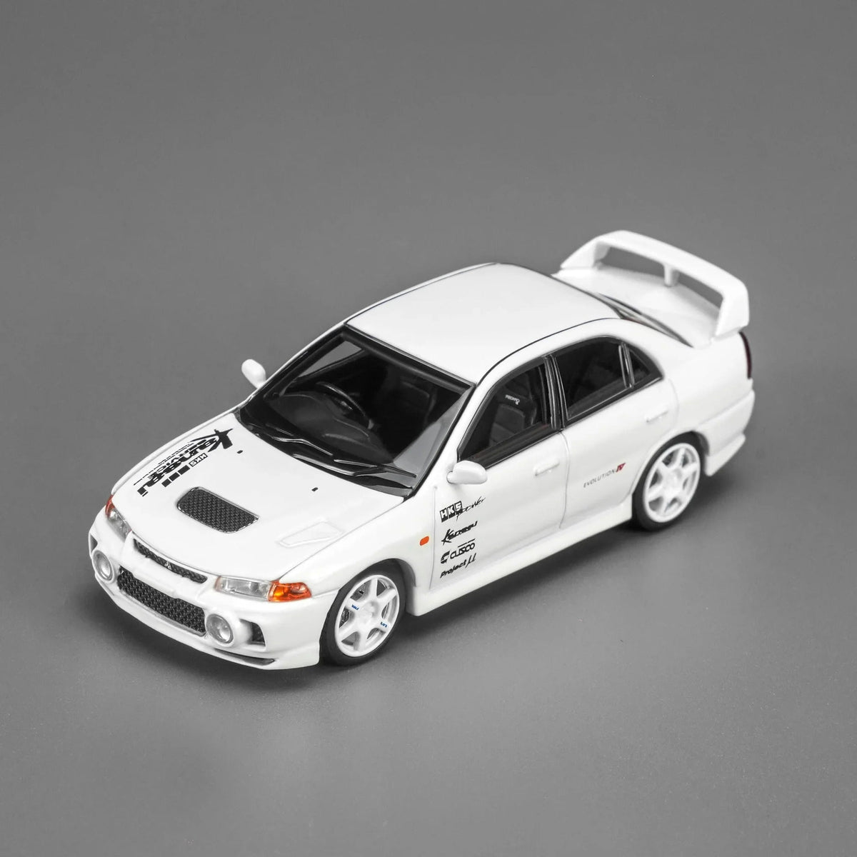 Mitsubishi Lancer Evolution IV GSR Kansai Livery, 1:64 Scale (White) collectible diecast model at Poketwheels