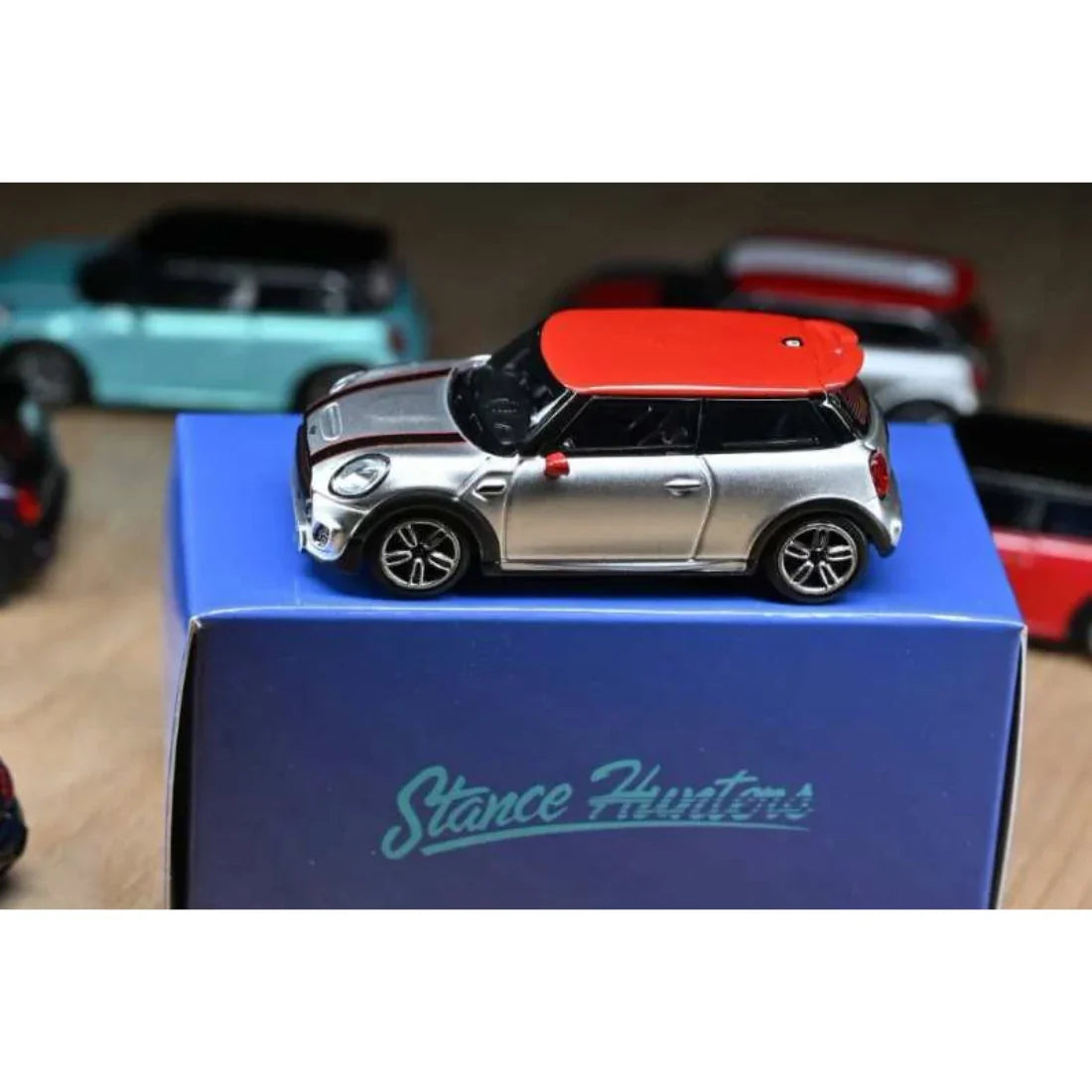 Mini Cooper Silver with Red Roof Top, 1:64 Scale collectible diecast model at Poketwheels