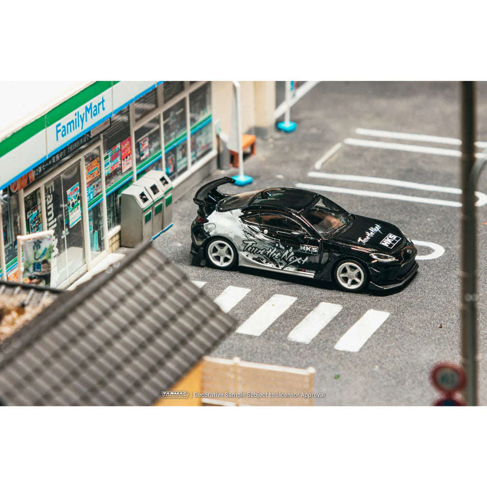 PRE-ORDER Tarmac Works HKS Toyota GR86 Chance of Chase Car, 1:64 Scale (Black)