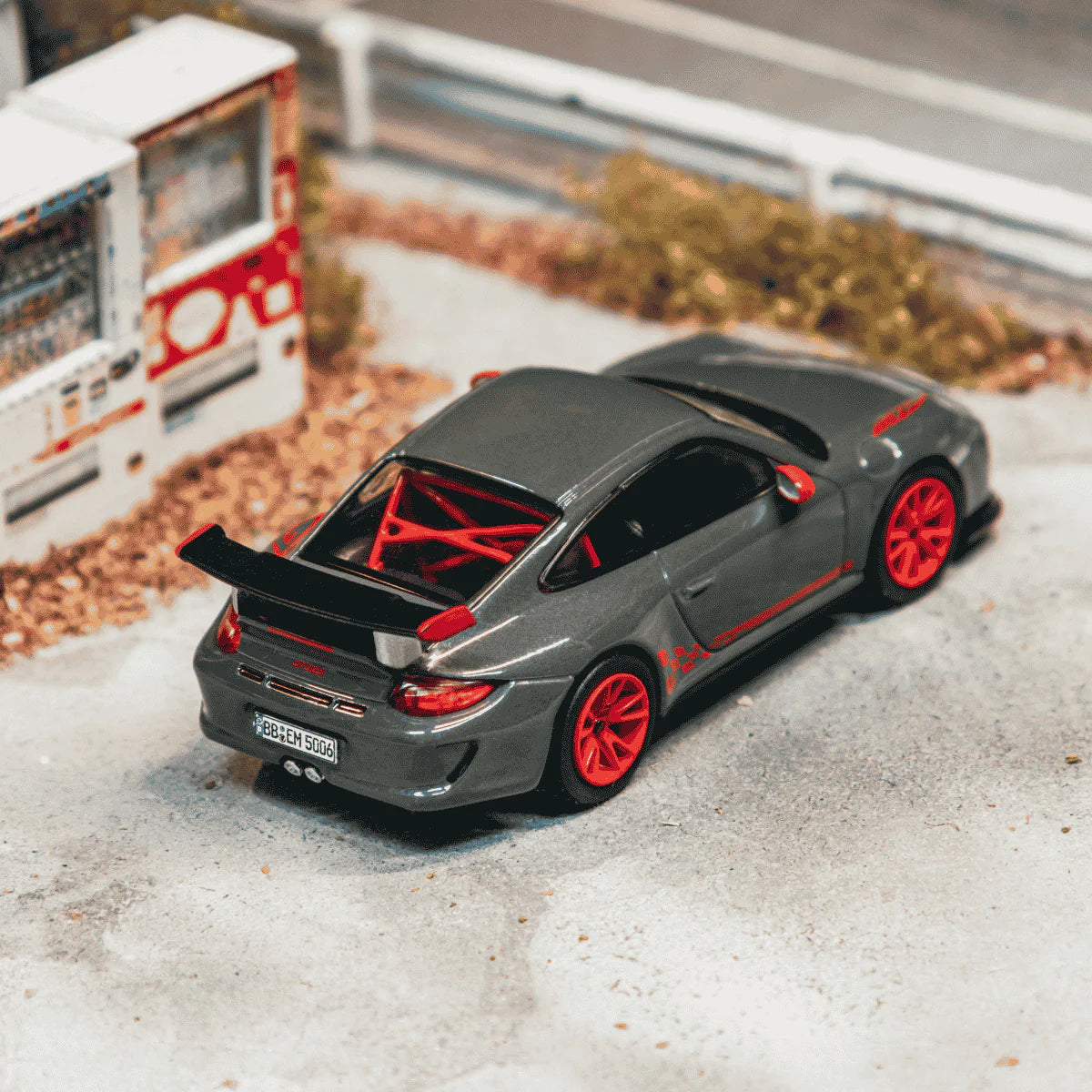PRE-ORDER Tarmac Works x iXO Models Porsche 911 GT3 RS (997.2) Chance of Chase Car, 1:64 Scale (Grey)