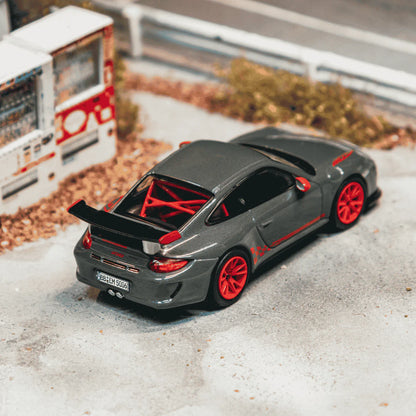 PRE-ORDER Tarmac Works x iXO Models Porsche 911 GT3 RS (997.2) Chance of Chase Car, 1:64 Scale (Grey)
