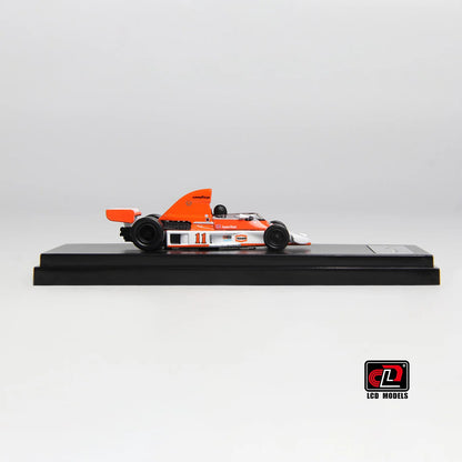 LCD McLaren M23 Orange with White 1:64 Scale Diecast Model
