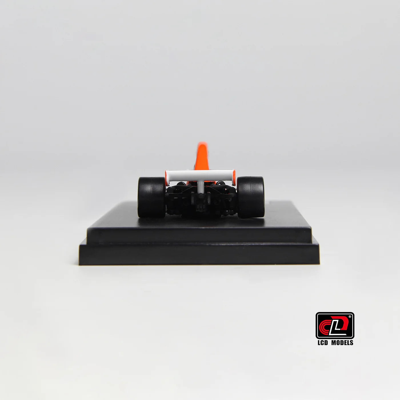 LCD McLaren M23 Orange with White 1:64 Scale Diecast Model